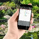 Seneye hand mobile phone seneye app pond copy.webp